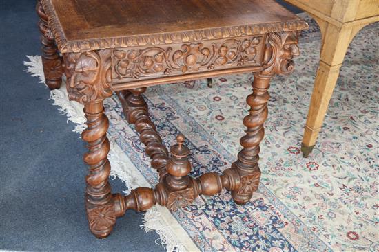 A late 19th century Flemish carved oak side table W.120cm